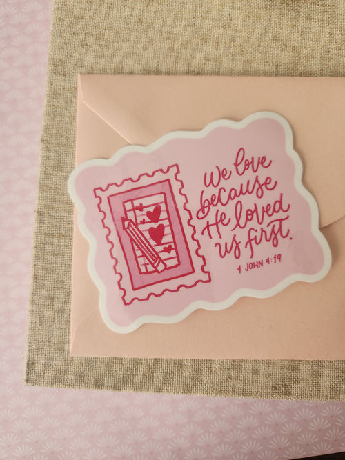 "He Loved Us First" Sticker