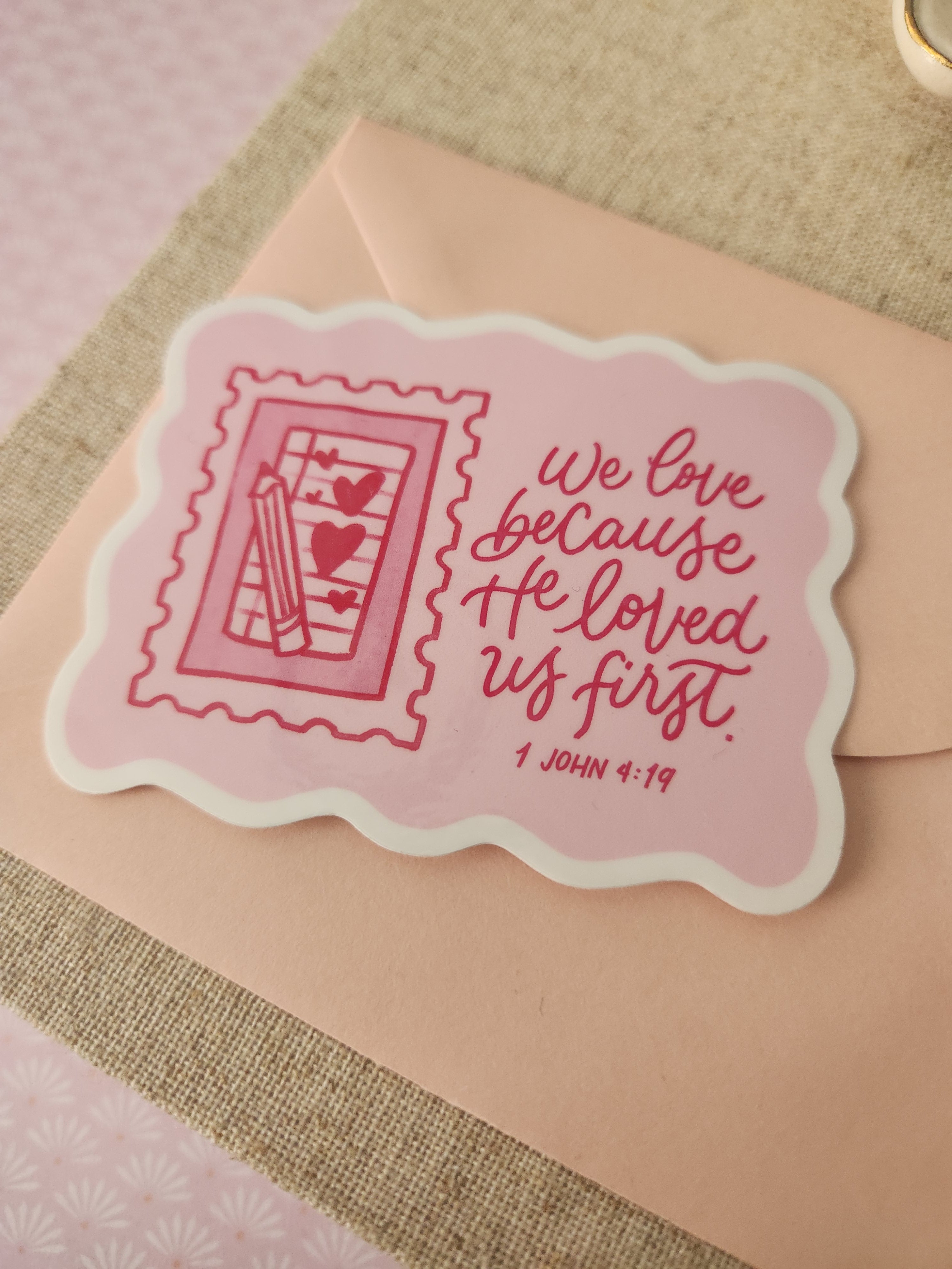 "He Loved Us First" Sticker